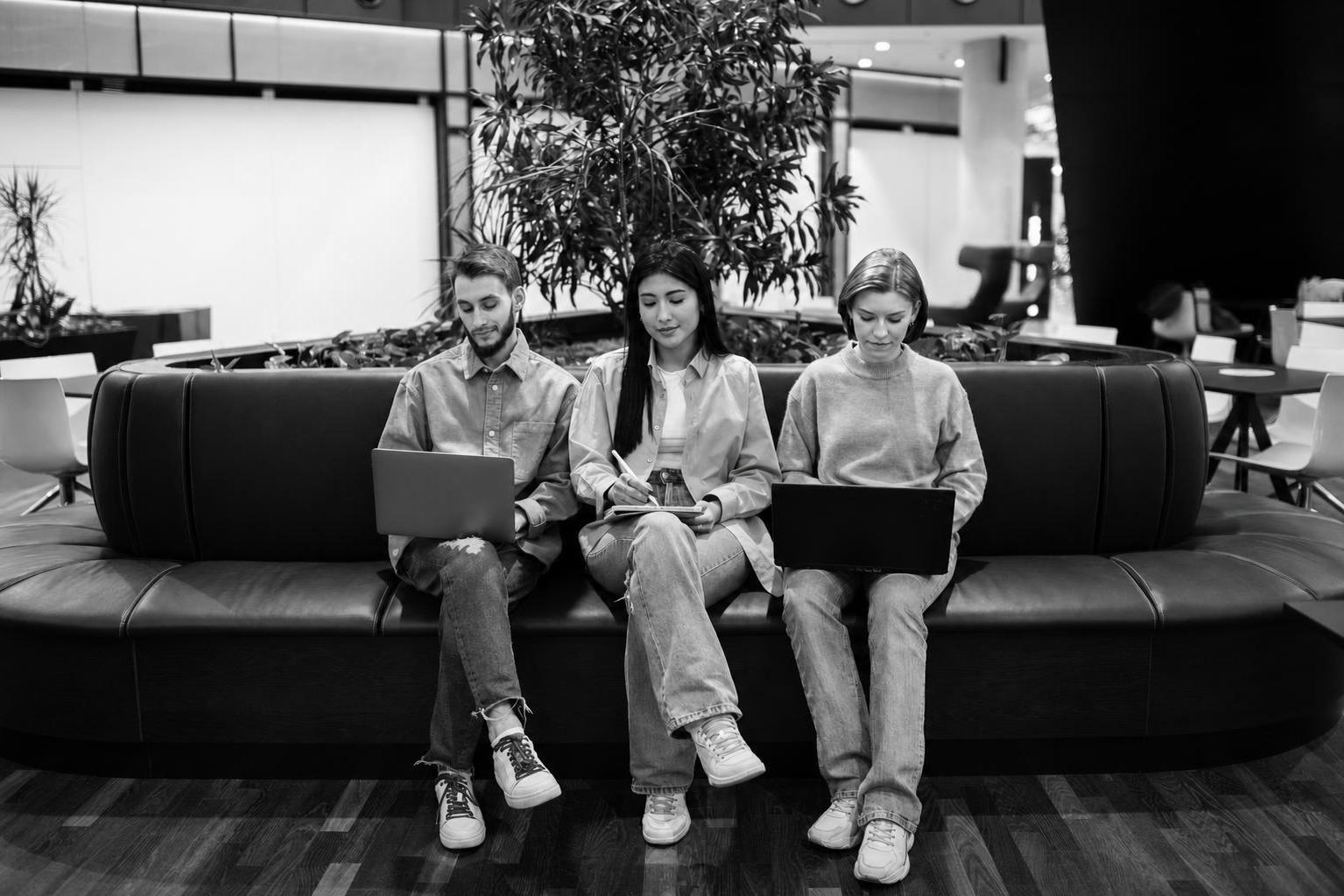 A small lean team of three working independently side by side